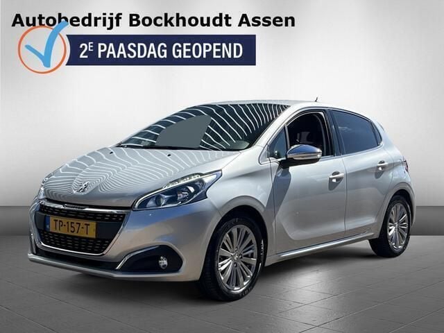 Grijs, metallic lak Gebruikt 2018 Peugeot 208 Allure Hatchback | € 9.240 (Eerlijke prijs) - Afbeelding 1/4