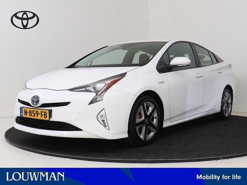 Licht wit metallic Gebruikt 2018 Toyota Prius Executive Hatchback | € 19.995 (Eerlijke prijs) - Afbeelding 1/3