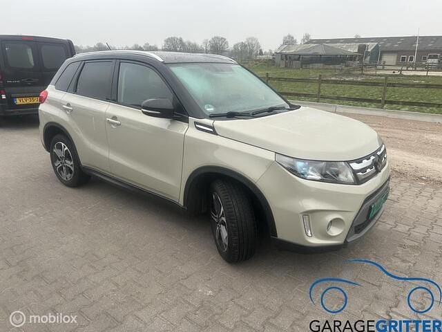 Bruin Occasion 2015 Suzuki Vitara SUV | € 12.950 (Goede deal) - Afbeelding 1/3