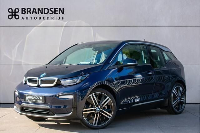 Blauw, metallic lak Gebruikt 2019 BMW i3 Basis Hatchback | € 15.900 (Eerlijke prijs) - Afbeelding 1/4