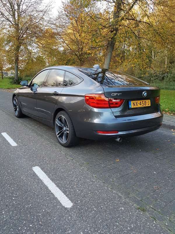 Grijs Gebruikt 2014 BMW 318 Gran Turismo Executive Sedan | € 12.950 - Afbeelding 1/4