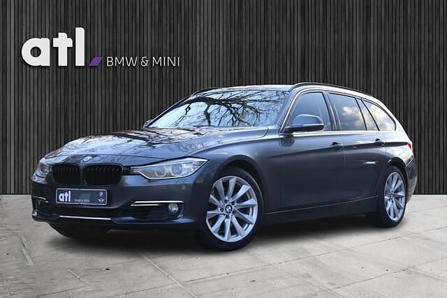 Grijs (metallic) Occasion 2013 BMW 328 Executive Stationwagen | € 15.950 (Eerlijke prijs) - Afbeelding 1/4