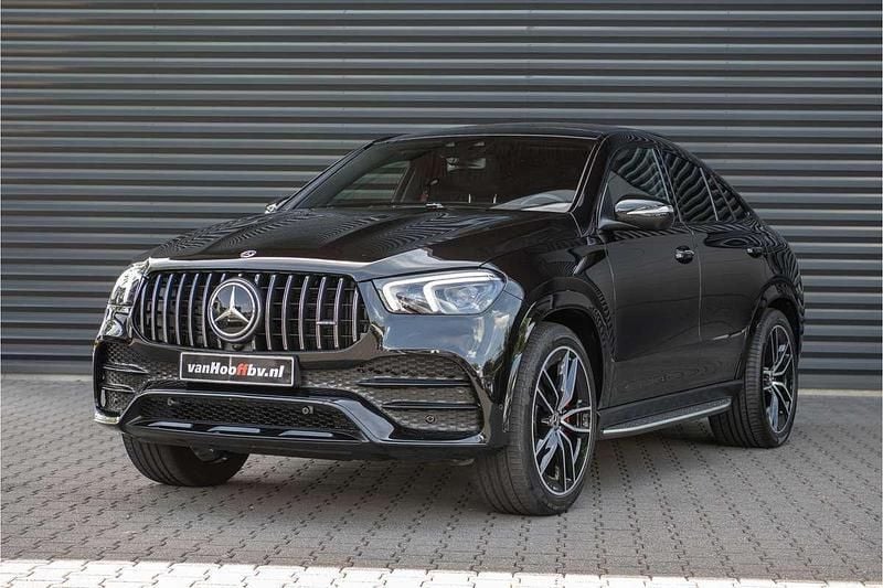Zwart, metallic lak Gebruikt 2021 Mercedes GLE350 AMG line Coupé | € 69.900 (Goede deal) - Afbeelding 1/4