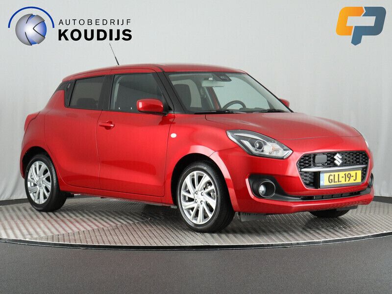 Rood, metallic lak Gebruikt 2024 Suzuki Swift Hatchback | € 18.890 (Eerlijke prijs) - Afbeelding 1/4