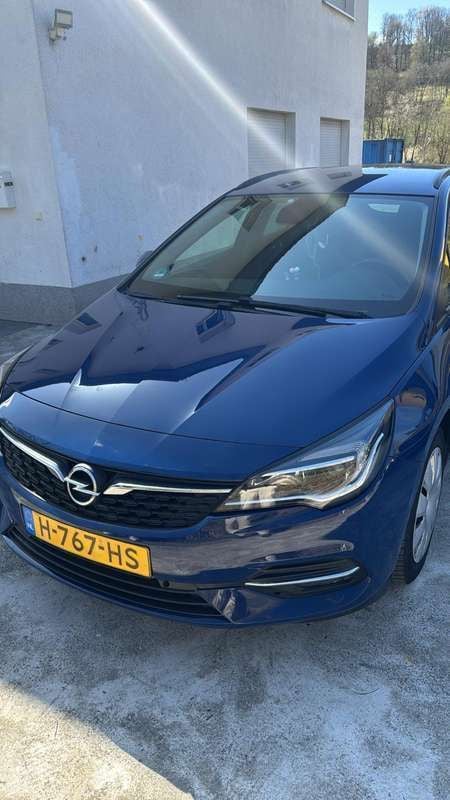 Blauw Gebruikt 2020 Opel Astra Edition Stationwagen | € 8.000 (Goede deal) - Afbeelding 1/4