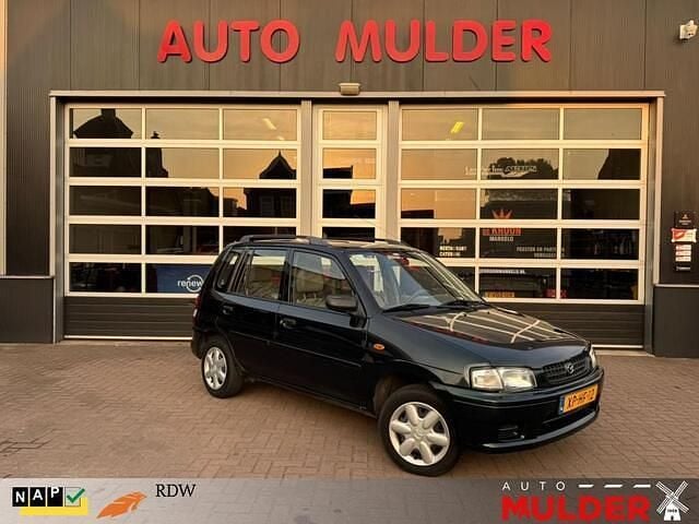 Groen Gebruikt 1999 Mazda Demio Stationwagen | € 1.250 (Eerlijke prijs) - Afbeelding 1/3