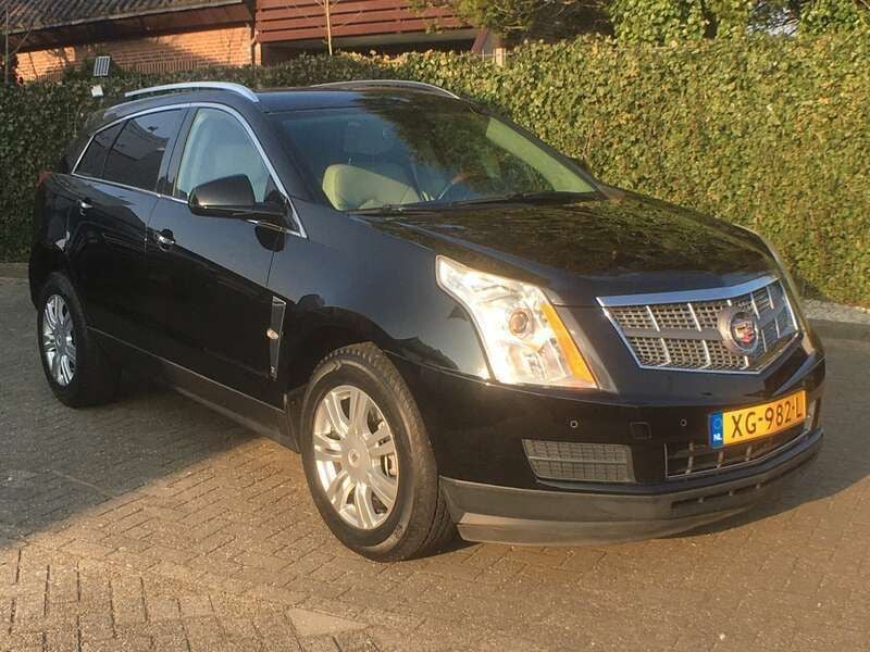 Zwart Gebruikt 2011 Cadillac SRX SUV | € 20.950 - Afbeelding 1/4