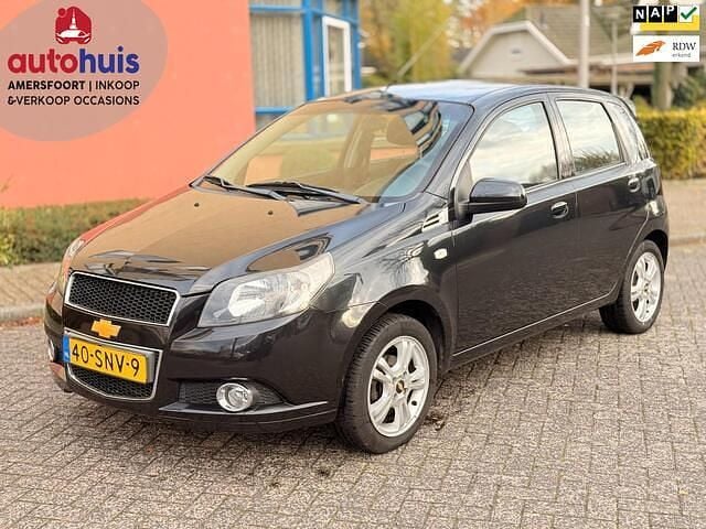 Zwart (metallic) Gebruikt 2011 Chevrolet Aveo LS Hatchback | € 2.995 (Eerlijke prijs) - Afbeelding 1/4