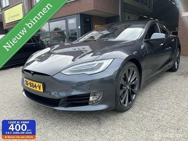 Grijs, metallic lak Gebruikt 2018 Tesla Model S Sedan | € 24.950 (Eerlijke prijs) - Afbeelding 1/4
