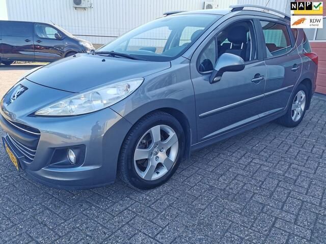 Grijs Gebruikt 2010 Peugeot 207 Stationwagen | € 2.649 (Eerlijke prijs) - Afbeelding 1/4