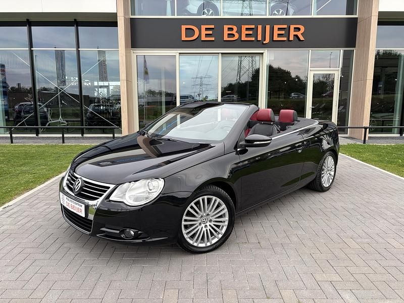 Zwart Gebruikt 2011 VW Eos Highline Cabriolet | € 9.950 (Duur) - Afbeelding 1/4