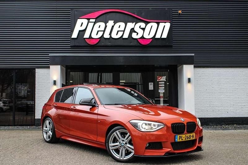 Oranje, metallic lak Gebruikt 2014 BMW 125 M Sport Hatchback | € 12.950 - Afbeelding 1/4
