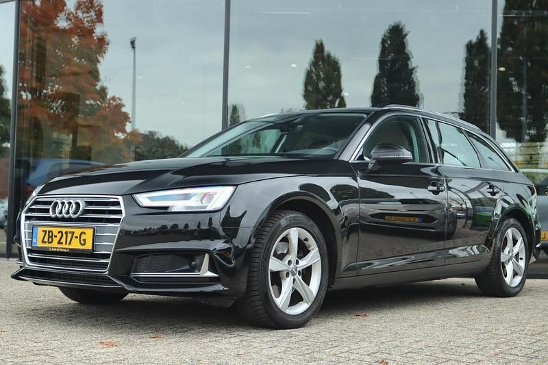 Zwart Gebruikt 2019 Audi A4 Sport Stationwagen | € 24.850 (Goede deal) - Afbeelding 1/4