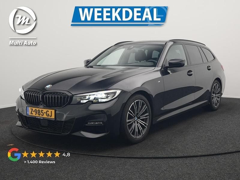 Zwart Occasion 2021 BMW 320 Executive Stationwagen | € 30.440 (Goede deal) - Afbeelding 1/3