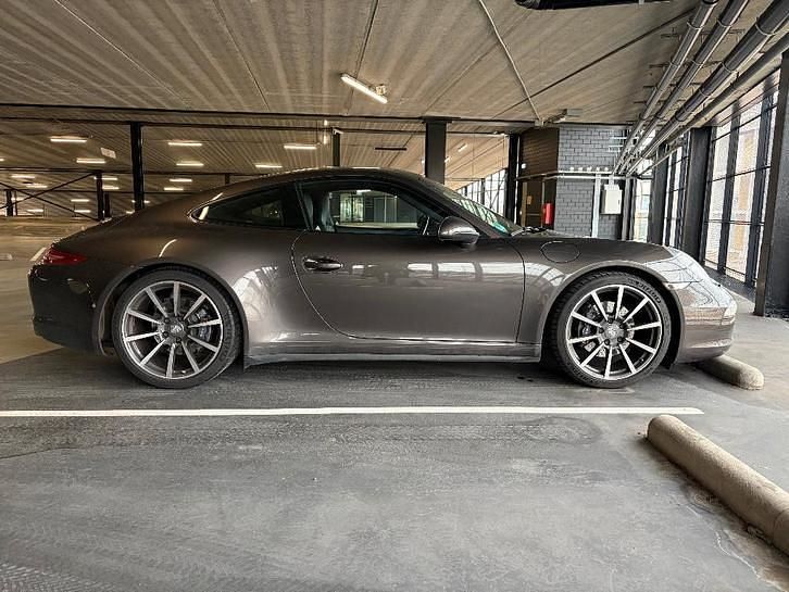 Grijs Occasion 2015 Porsche 911 Carrera 4 Coupé | € 72.911 - Afbeelding 1/4