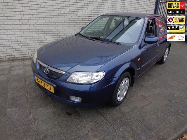 Blauw (metallic) Gebruikt 2001 Mazda 323 Touring Hatchback | € 2.950 (Eerlijke prijs) - Afbeelding 1/4