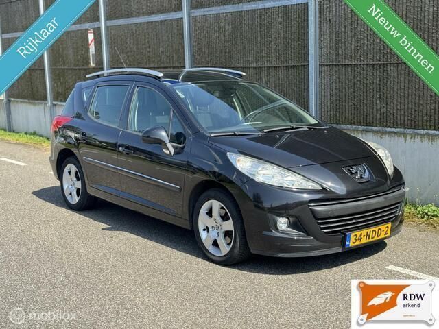 Zwart Gebruikt 2010 Peugeot 207 Stationwagen | € 3.999 (Iets duurder) - Afbeelding 1/4