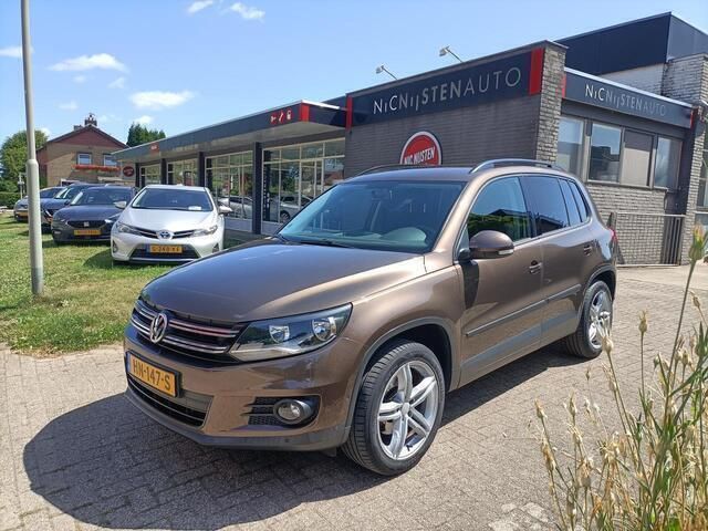 Bruin Gebruikt 2014 VW Tiguan SUV | € 12.250 (Iets duurder) - Afbeelding 1/4