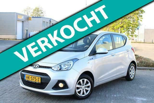 Grijs Gebruikt 2015 Hyundai i10 Comfort Hatchback | € 6.499 (Eerlijke prijs) - Afbeelding 1/4