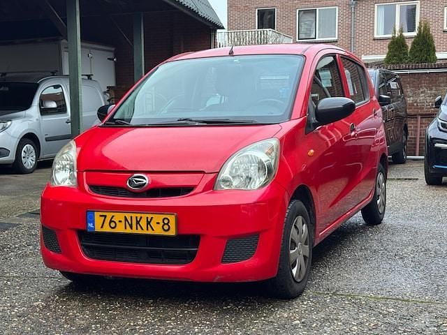Occasion Daihatsu Cuore 69 PK (50 kW) 2010 Rood Hatchback