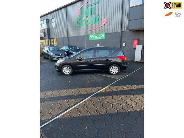 Zwart Gebruikt 2011 Peugeot 207 Access Stationwagen | € 2.250 (Goede deal) - Afbeelding 1/4