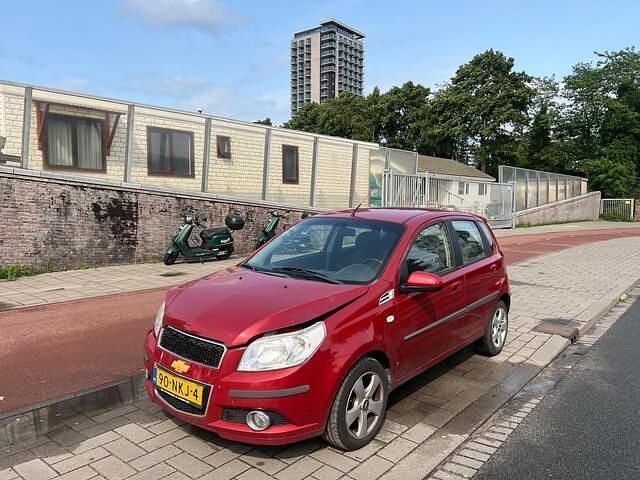 Rood Gebruikt 2010 Chevrolet Aveo LS Hatchback | € 750 (Super prijs) - Afbeelding 1/4