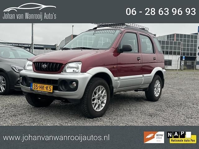 Rood (metallic) Occasion 2001 Daihatsu Terios SUV | € 4.950 (Iets duurder) - Afbeelding 1/4