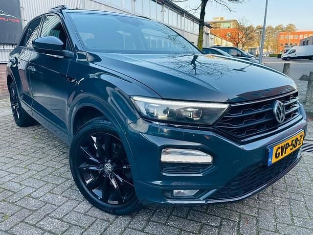 Grijs Gebruikt 2019 VW T-Roc R-line SUV | € 16.999 (Super prijs) - Afbeelding 1/4
