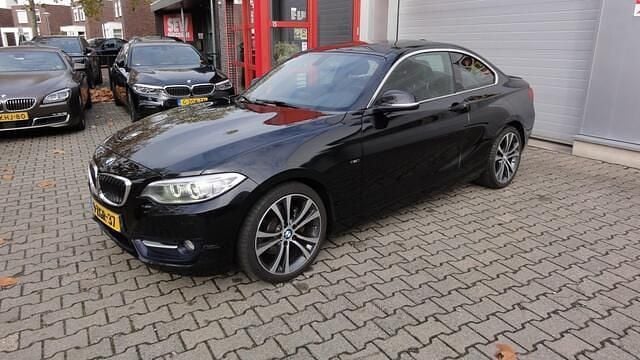 Zwart Gebruikt 2015 BMW 220 Executive Coupé | € 13.950 (Goede deal) - Afbeelding 1/4