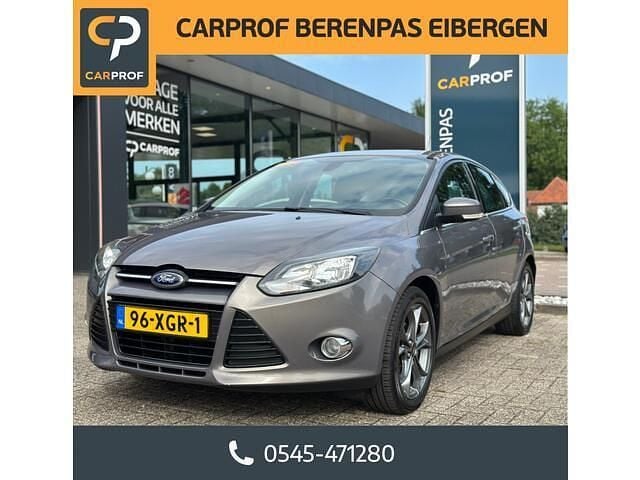 Bruin Gebruikt 2012 Ford Focus Titanium Hatchback | € 5.950 (Eerlijke prijs) - Afbeelding 1/4