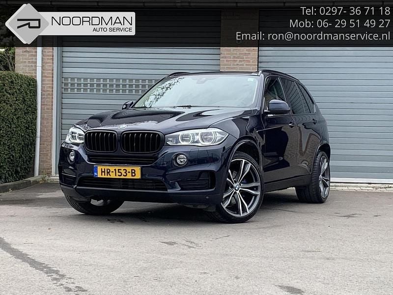 Blauw (metallic) Gebruikt 2015 BMW X5 Executive SUV | € 21.250 (Eerlijke prijs) - Afbeelding 1/4