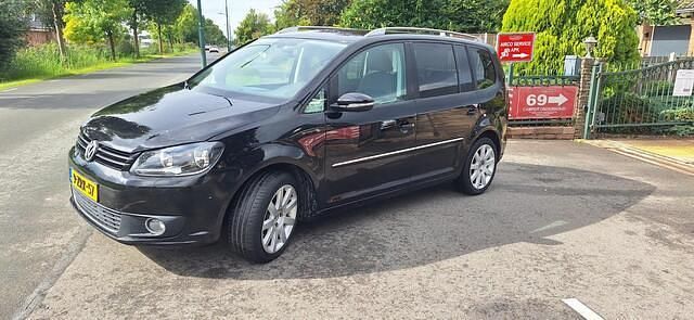 Zwart Gebruikt 2011 VW Touran Highline MPV | € 2.550 - Afbeelding 1/4