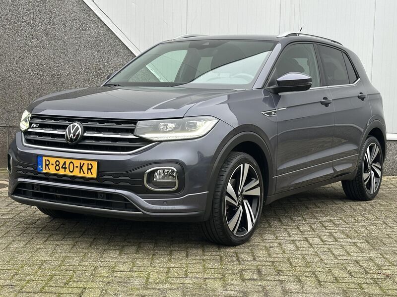 Grijs Gebruikt 2022 VW T-Cross R-line SUV | € 22.980 (Eerlijke prijs) - Afbeelding 1/4