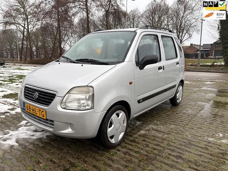 Grijs Occasion 2001 Suzuki Wagon R+ GL Stationwagen | € 2.750 (Eerlijke prijs) - Afbeelding 1/4