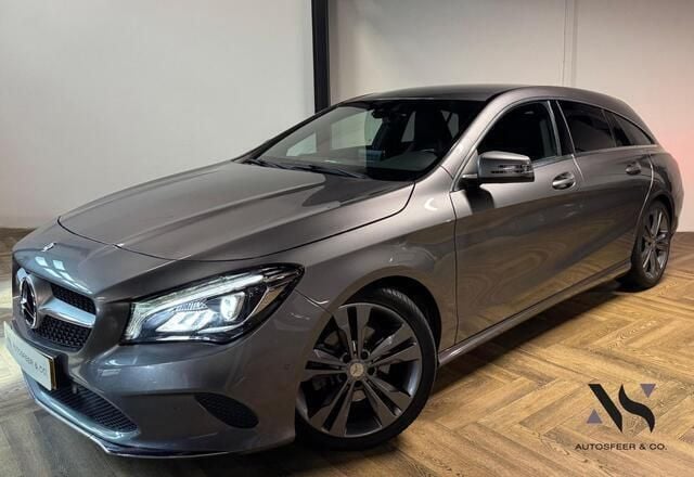 Grijs, metallic lak Gebruikt 2018 Mercedes CLA180 Shooting Brake Business Stationwagen | € 20.940 (Goede deal) - Afbeelding 1/4