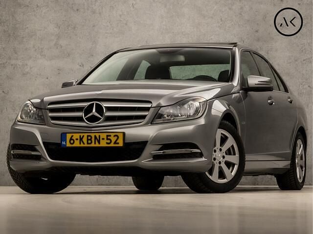 Grijs, metallic lak Gebruikt 2012 Mercedes C180 Avantgarde Sedan | € 13.945 (Iets duurder) - Afbeelding 1/4