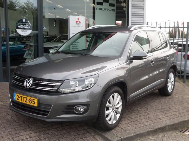 Grijs Gebruikt 2014 VW Tiguan Style SUV | € 13.950 (Eerlijke prijs) - Afbeelding 1/4