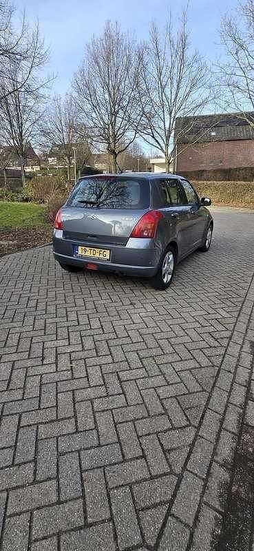 Occasion Suzuki Swift 92 PK (67 kW) 2006 Grijs Hatchback
