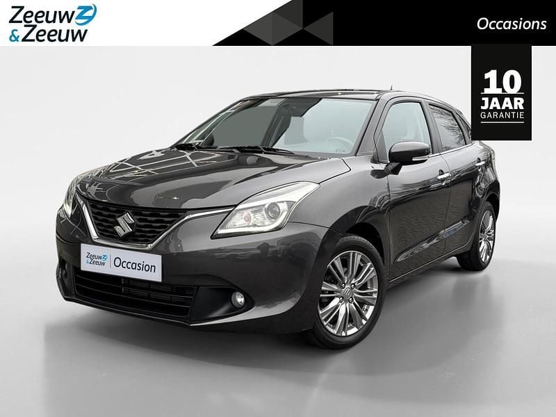 Grijs Occasion 2018 Suzuki Baleno Hatchback | € 13.950 (Eerlijke prijs) - Afbeelding 1/4