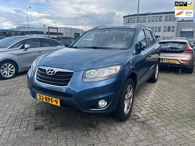 Blauw Gebruikt 2011 Hyundai Santa Fe Dynamiq SUV | € 5.700 (Goede deal) - Afbeelding 1/4