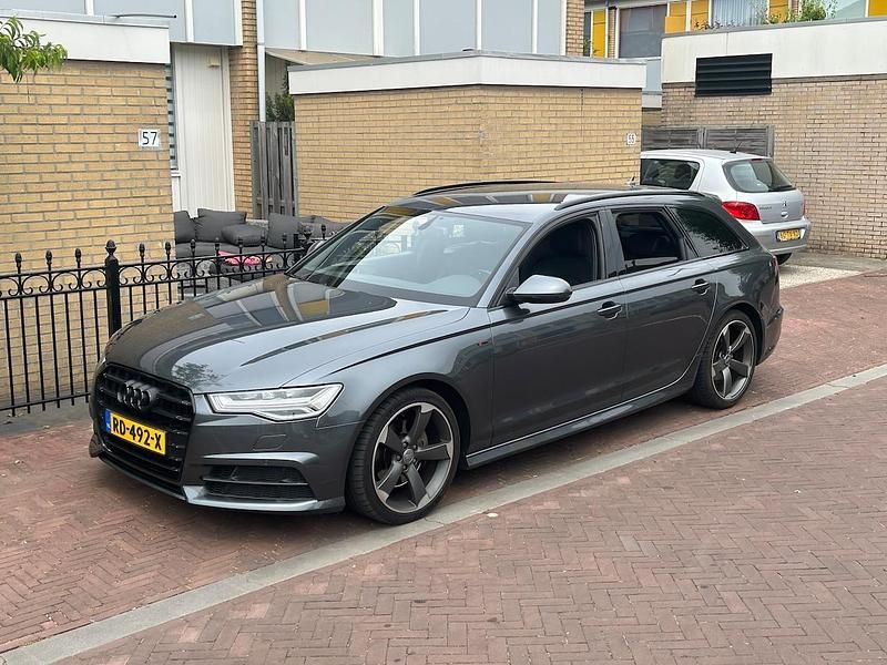 Grijs Gebruikt 2018 Audi A6 S-Line Stationwagen | € 25.950 (Goede deal) - Afbeelding 1/4
