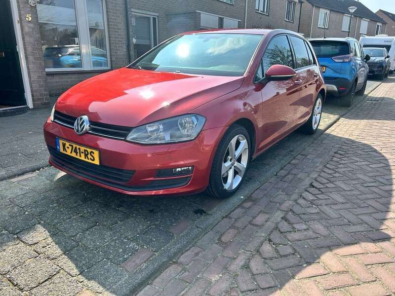Rood Gebruikt 2014 VW Golf VII Highline Stationwagen | € 9.250 (Eerlijke prijs) - Afbeelding 1/4