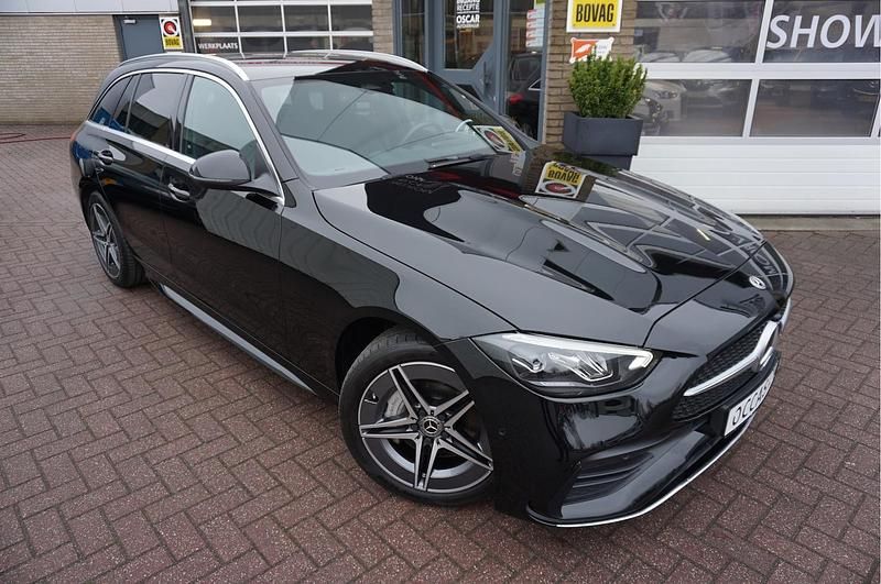 Occasion Mercedes C300 AMG line 2022 Zwart (metallic) Stationwagen