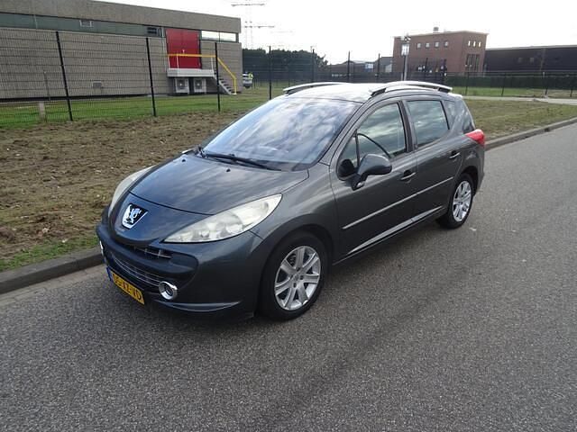 Grijs Gebruikt 2007 Peugeot 207 Stationwagen | € 1.595 (Eerlijke prijs) - Afbeelding 1/4