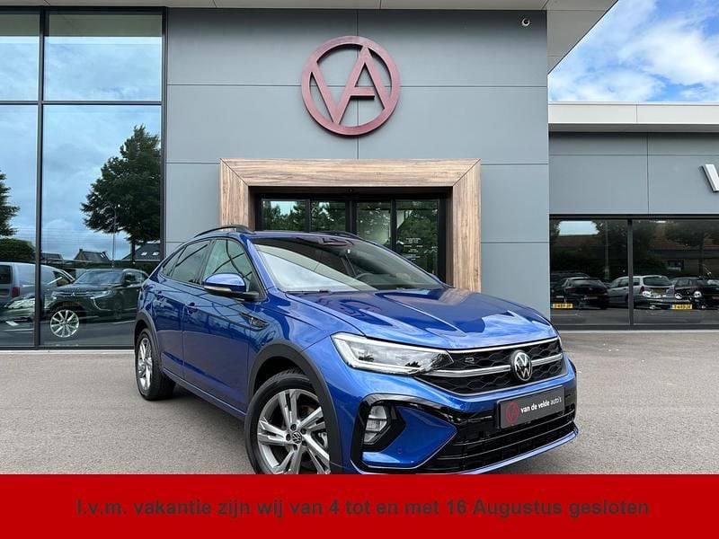 Blauw Gebruikt 2022 VW Taigo R-line SUV | € 26.745 (Super prijs) - Afbeelding 1/4