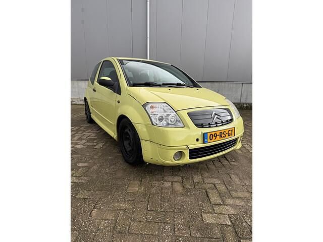 Geel Gebruikt 2005 Citroën C2 VTR Sport Hatchback | € 750 (Goede deal) - Afbeelding 1/4