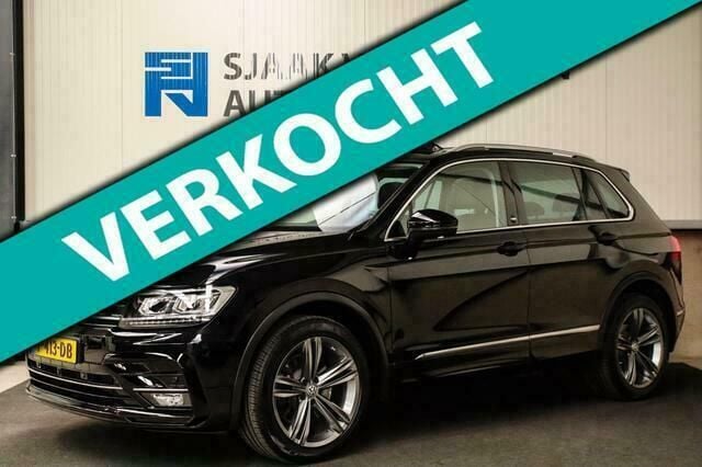 Zwart Gebruikt 2017 VW Tiguan Highline SUV | € 36.950 - Afbeelding 1/4