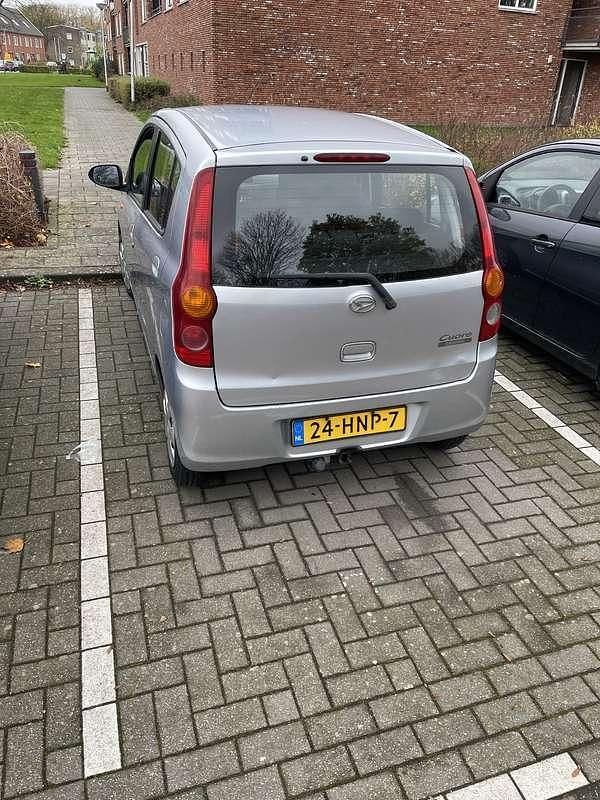 Occasion Daihatsu Cuore 69 PK (50 kW) 2009 Grijs Hatchback