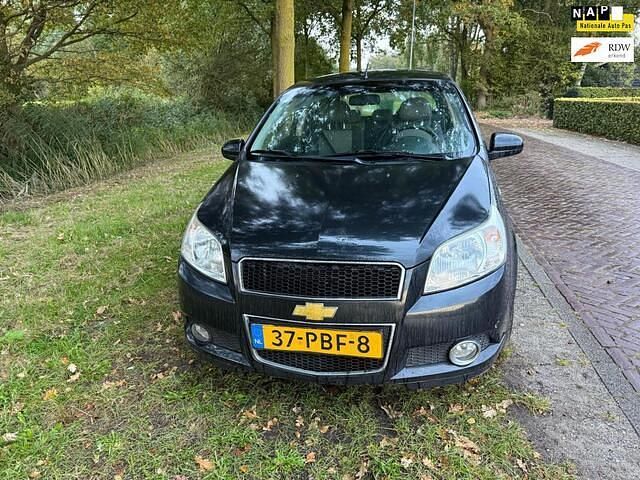 Zwart Gebruikt 2011 Chevrolet Aveo LS Hatchback | € 1.299 (Super prijs) - Afbeelding 1/4