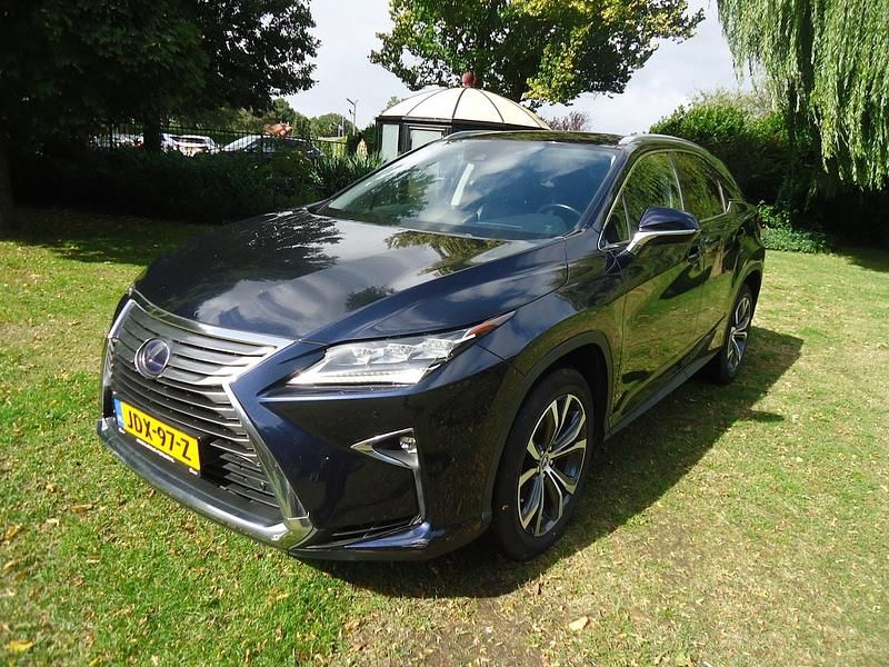 Blauw (metallic) Gebruikt 2018 Lexus RX450h Luxury Line SUV | € 38.500 - Afbeelding 1/4